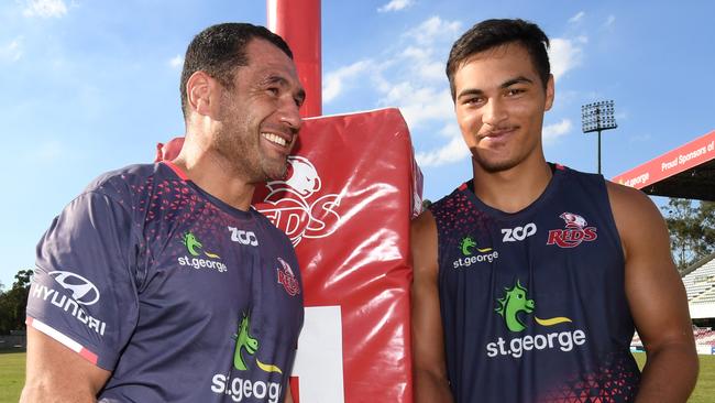 George Smith (left) and Jordan Petaia pose for a photo after a Queensland Reds training session in Brisbane, Thursday, April 26, 2018. (AAP Image/Dan Peled) NO ARCHIVING