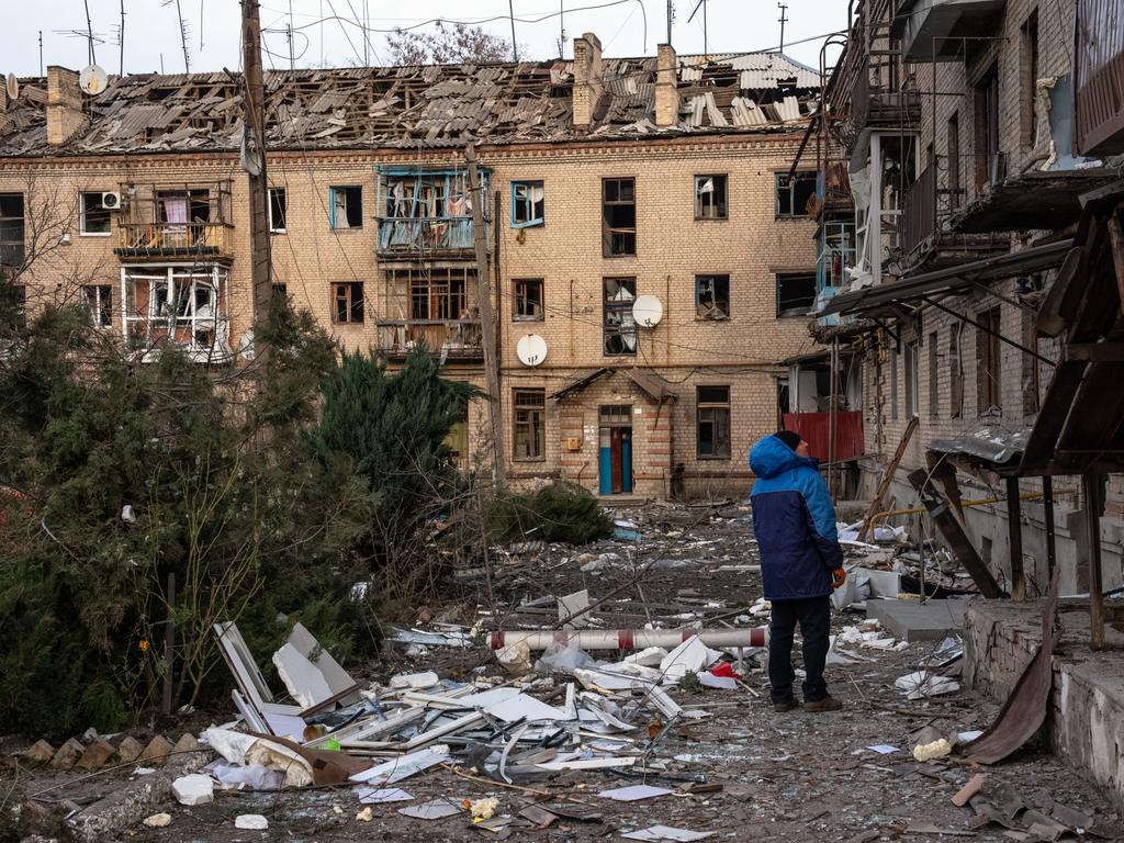 A man looks up at his apartment block after it was heavily damaged in a Russian attack earlier in the day, on January 22, 2025 in Kostyantynivka, Ukraine. Carl Court/Getty Images