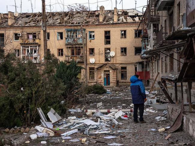 A man looks up at his apartment block after it was heavily damaged in a Russian attack earlier in the day, on January 22, 2025 in Kostyantynivka, Ukraine. Carl Court/Getty Images