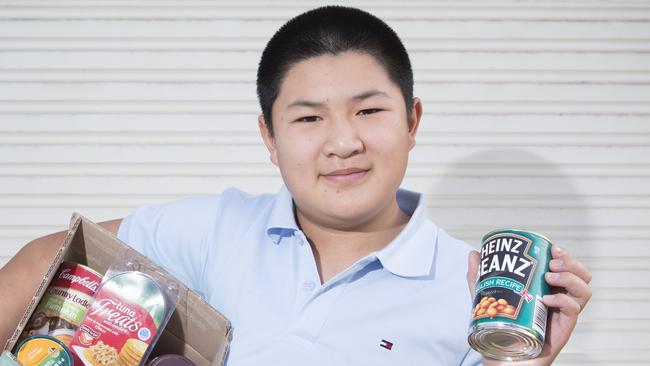 Joshua Tran, 12, started the Pay it Forward Sydney Facebook page to learn empathy and compassion. Picture: Melvyn Knipe