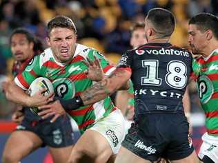 Samuel Burgess of the Rabbitohs (left) is tackled by Gerard Beale of the New Zealand Warriors. Picture: FIONA GOODALL