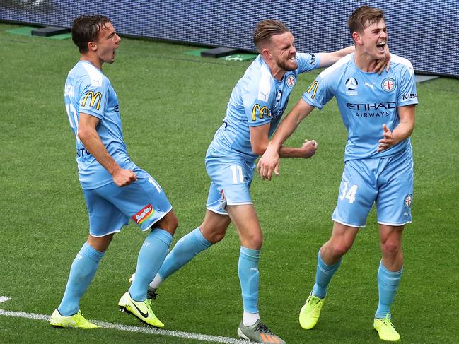 Conor Metcalfe of Melbourne City celebrates his goal with Denis Genreau and Craig Noone during the Round 4 A-League match between Melbourne City FC and Wellington Phoenix at AAMI PARK in Melbourne, Sunday, November 3, 2019. (AAP Image/George Salpigtidis) NO ARCHIVING, EDITORIAL USE ONLY
