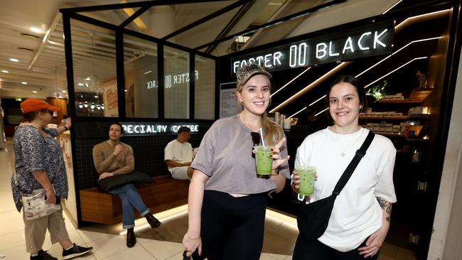 Georgie Groth and Katie Hayden getting a drink at Uptown. Picture: David Clark