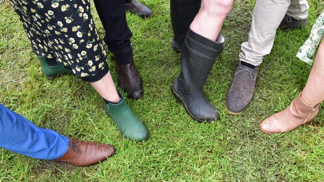 Race-goers show off their footwear.