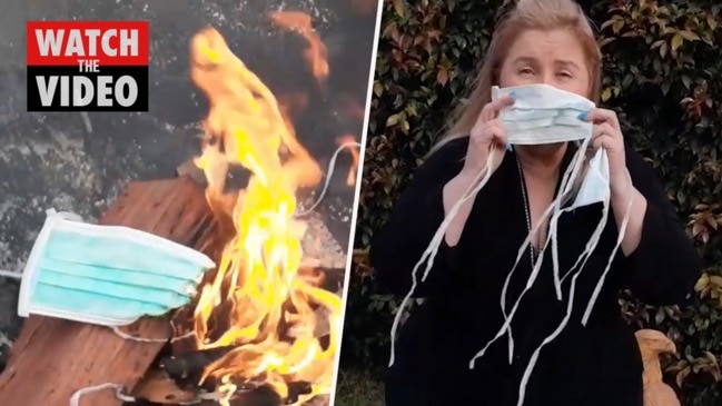 Bunnings protester burns masks in defiance