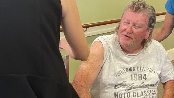 Anthony Hardy, 66, receives his coronavirus vaccine at IRT Woonona.