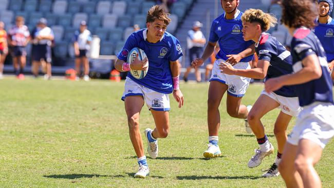 Buildcorp Emerging Reds Cup action from the day one match between Queensland Country Under-14s and Brisbane Junior Rugby Union Under-14s. Picture credit: QRU Media/ Erick Lucero.