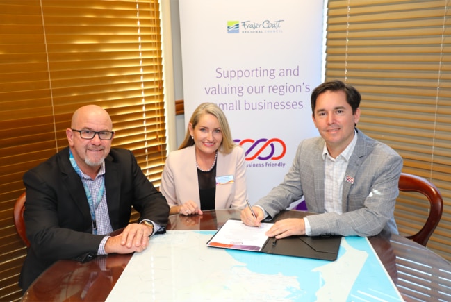 (L to R) Fraser Coast Regional Council CEO Ken Diehm, Queensland Small Business Commissioner Maree Adshead, and Mayor George Seymour signing the Small Business Friendly Council Charter.