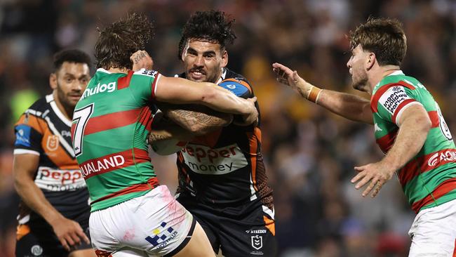 Terrell May, overlooked for Origin I by Blues coach Laurie Daley, fends off the Rabbitohs at Campbelltown on Sunday. His form in 2025 can’t be denied, but a coach looks for other attributes as well. Picture: Getty