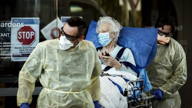 An Epping Gardens resident is taken away in an ambulance on July 28Photo by Darrian Traynor/Getty Images