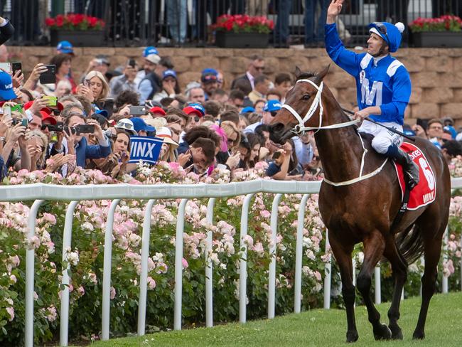 Cox Plate day at Moonee Valley Racecourse. Winx wins the Cox Plate with Hugh Bowman onboard. Winx and Bowman salute the crowd after the win.Picture Jay Town