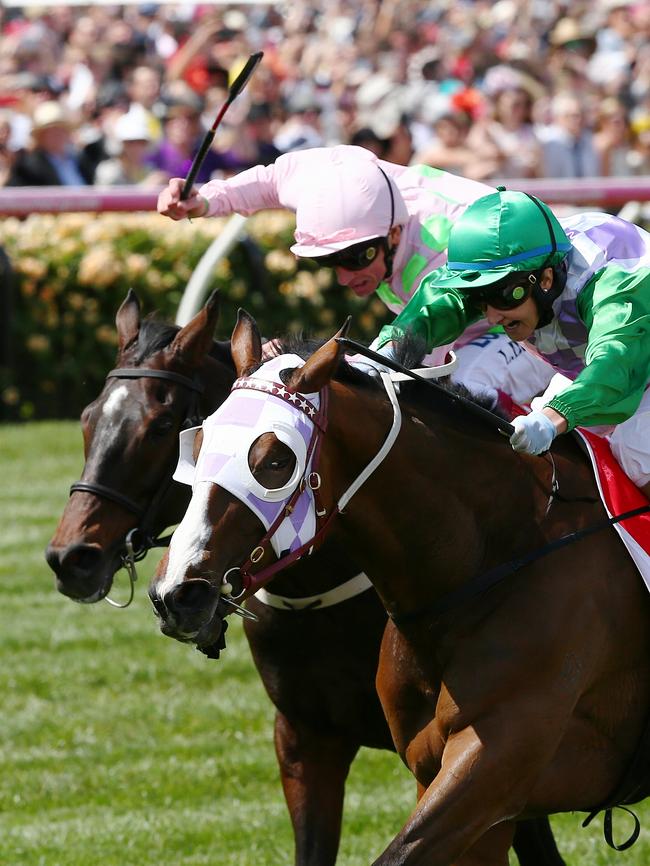 Michelle Payne rides Prince of Penzance to victory in last year’s Melbourne Cup. Picture: George Salpigtidis