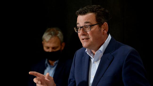 Victorian Premier Daniel Andrews gives his daily Covid press conference in Melbourne as Chief Health Officer Brett Sutton watches on. Picture: NCA NewsWire / Andrew Henshaw