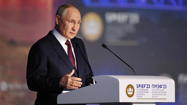 Russian President Vladimir Putin gives a speech at a plenary session of the Saint Petersburg International Economic Forum (SPIEF) in Saint Petersburg on June 16, 2023. (Photo by Ramil Sitdikov / Host photo agency RIA Novosti / AFP) / RESTRICTED TO EDITORIAL USE - MANDATORY CREDIT 