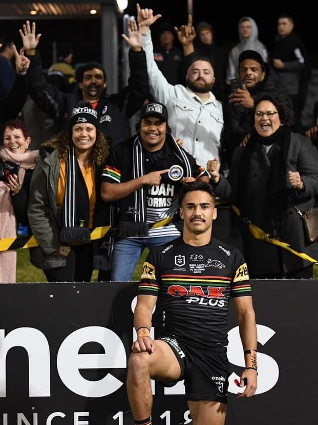 Daine Laurie with his family who travelled to see his first NRL game at Penrith Stadium.