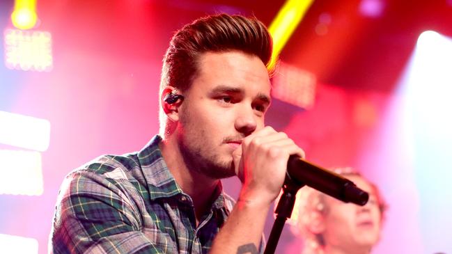 FILE - OCTOBER 16: Singer Liam Payne, a former member of One Direction, died after falling from a hotel in Buenos Aires, Argentina. He was 31 years old. BURBANK, CA - NOVEMBER 22:  Musician Liam Payne performs onstage at the "One Direction iHeartRadio Album Release Party" hosted by Ryan Seacrest at the iHeartRadio Theater Los Angeles Ãâ Clear Channel's new music and events venue located at The Burbank Studios in Burbank, CA  (Photo by Christopher Polk/Getty Images for Clear Channel)