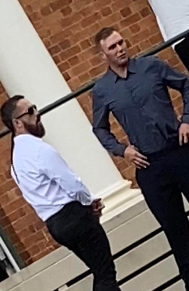 Bronson Buggy and Callum Robert McClay talk outside the Gympie courthouse on February 3, 2023.