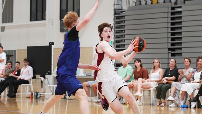 Basketball Australia Schools Championships at Carrara. Mens open final, Lake Ginninderra College Lakers V TSS (in white). Tss's Jack Foley shows his speed in the final. Picture Glenn Hampson