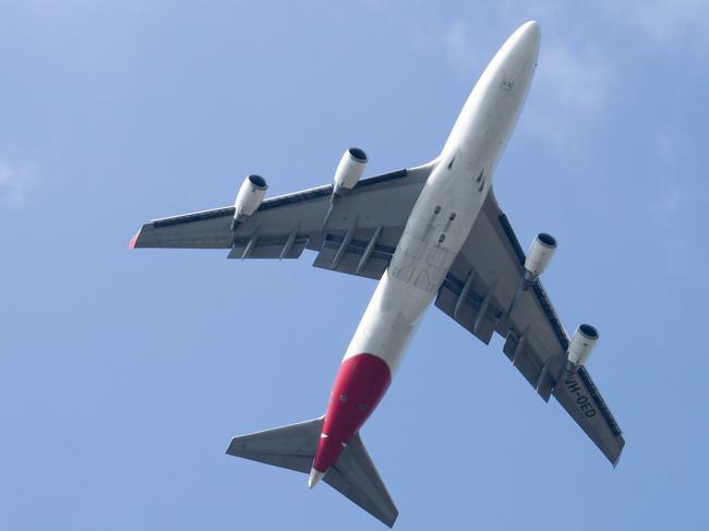 Qantas Airways takeoff from Chiangmai airport from Sydney.  Aircraft generic.