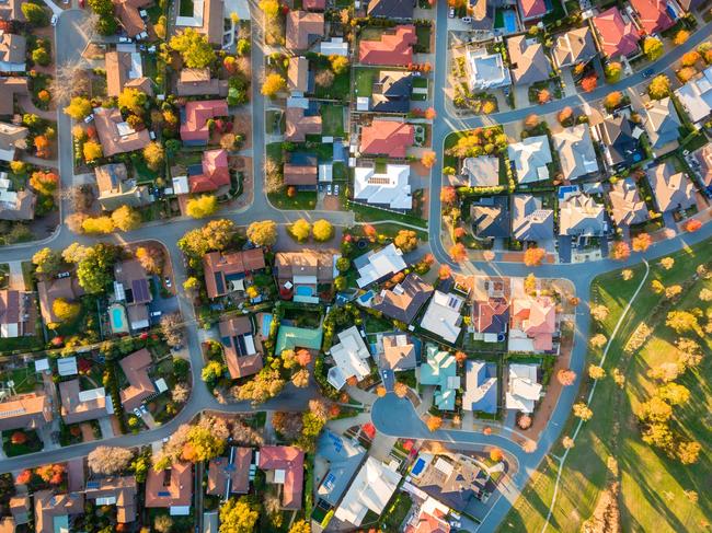 Typical Australian suburb from above in autumn; housing overhead generic