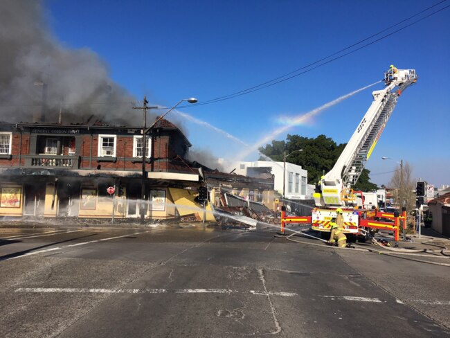 More than 60 firefighters are working to control the blaze. Picture: Fire and Rescue NSW