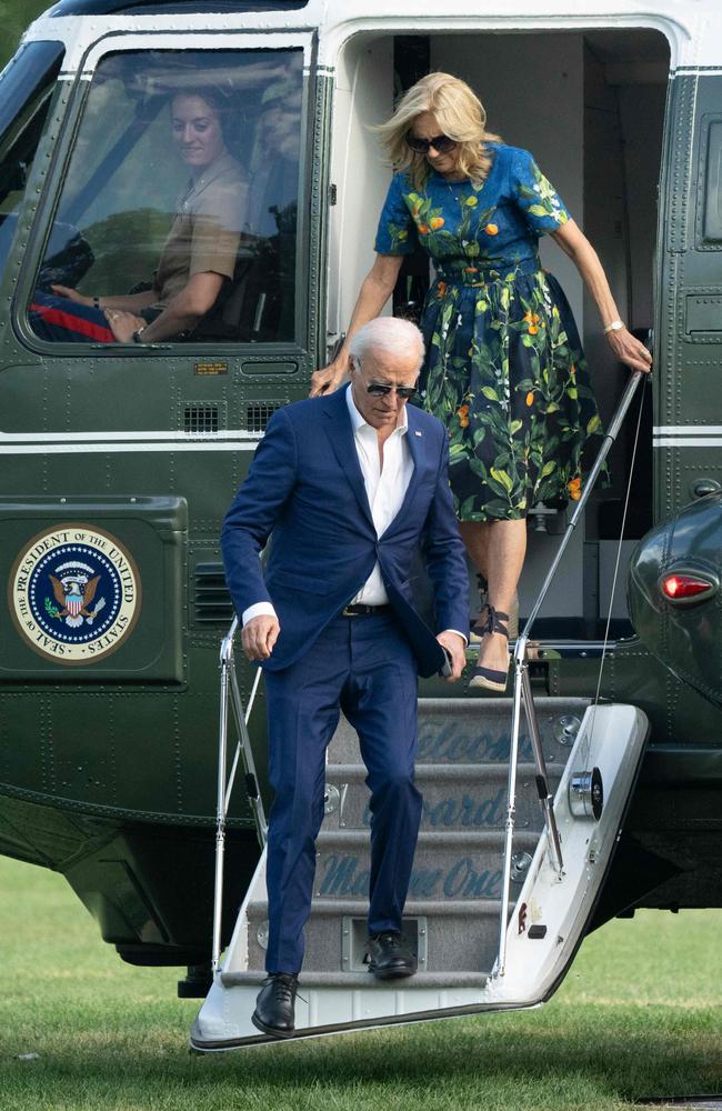 Joe Biden and wife Jill step off of Marine One as they return to the White House. Picture: AFP