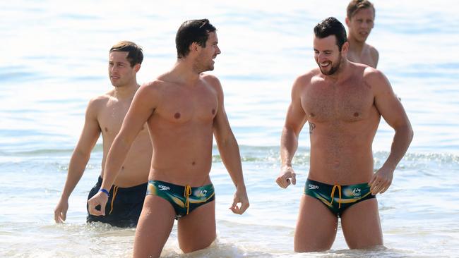 Josh Beaver, James Roberts, James Magnussen and Travis Mahoney soak up the sun in Rio. Picture: Alex Coppel