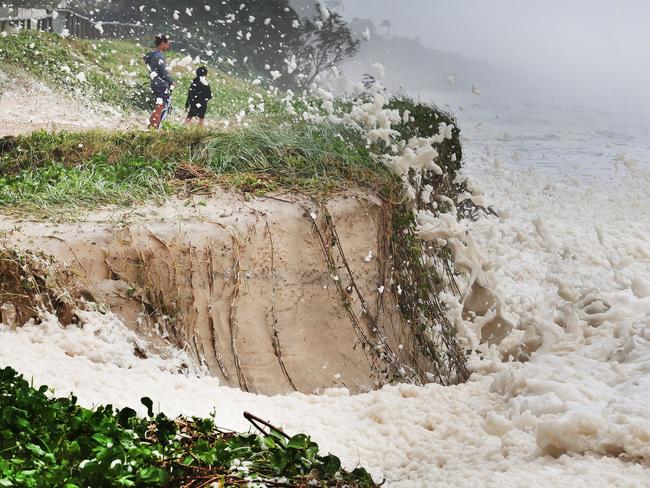 Erosion and foam make for a spectacle at Main Beach on the Gold Coast this week. Picture: Glenn Hampson