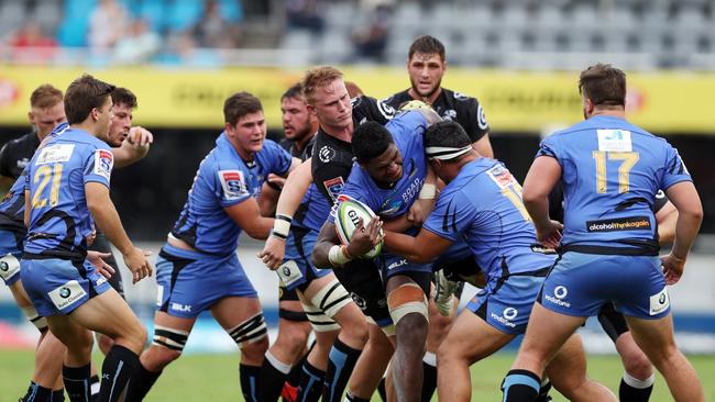 Western Force’s Isi Naisarani is tackled during their Super Rugby loss to the Sharks.