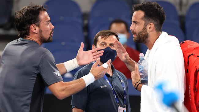 Salvatore Caruso and Fabio Fognini weren’t too happy with each other. Picture: AFP Photo