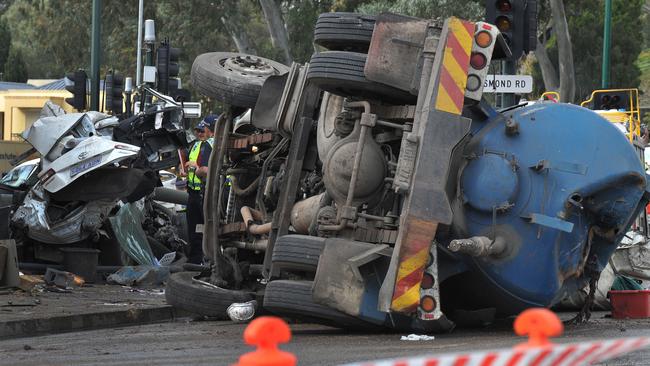 The wreckage of the fatal crash at the bottom of the freeway. Picture: Roger Wyman