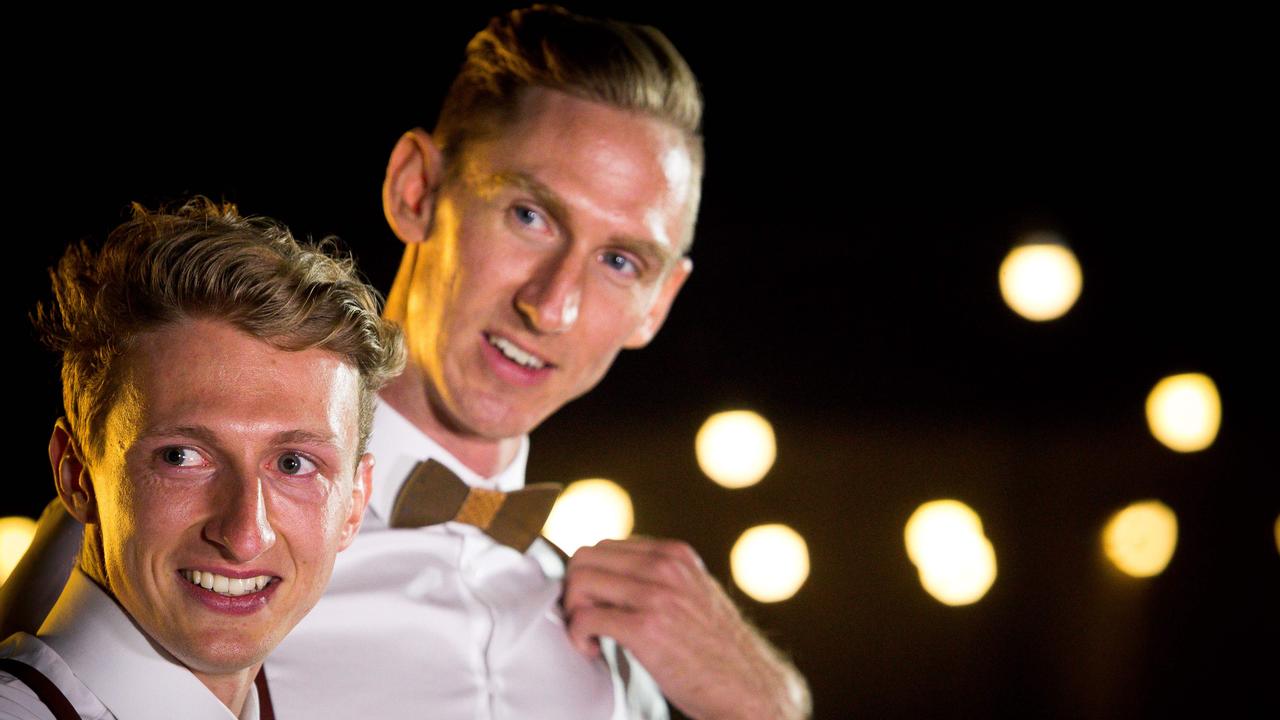 Commonwealth Games sprinter Craig Burns (right) and husband Luke Sullivan at their wedding. Picture: AAP