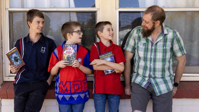 Tristian Wesker with his boys Logan, Leon and Wade have been helped by the Smith Family back to School appeal. Picture: Kelly Barnes