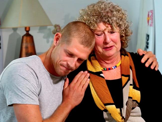 Mick Fanning with his mother, Liz, after his close call with a shark in South Africa.