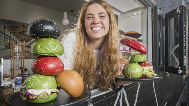 Beatriz Ribeiro, 25, with Too Many Chiefs cafe's new coloured burger buns. Picture: Jason Edwards