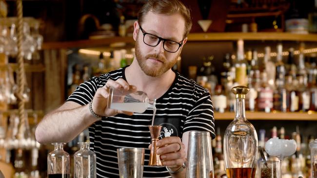 Hains &amp; Co. barman mixing up a new cocktail. Photo Naomi Jellicoe