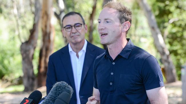 The-then premier Steven Marshall watches the-then environment and water Minister David Speirs on February 26 at Felixstow Reserve, where he announced funds to restore wildlife to the area. Picture: Brenton Edwards