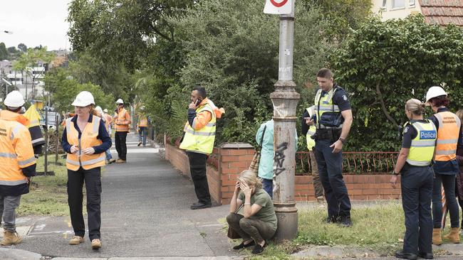 Police keep an eye on protesters. Picture: Ellen Smith