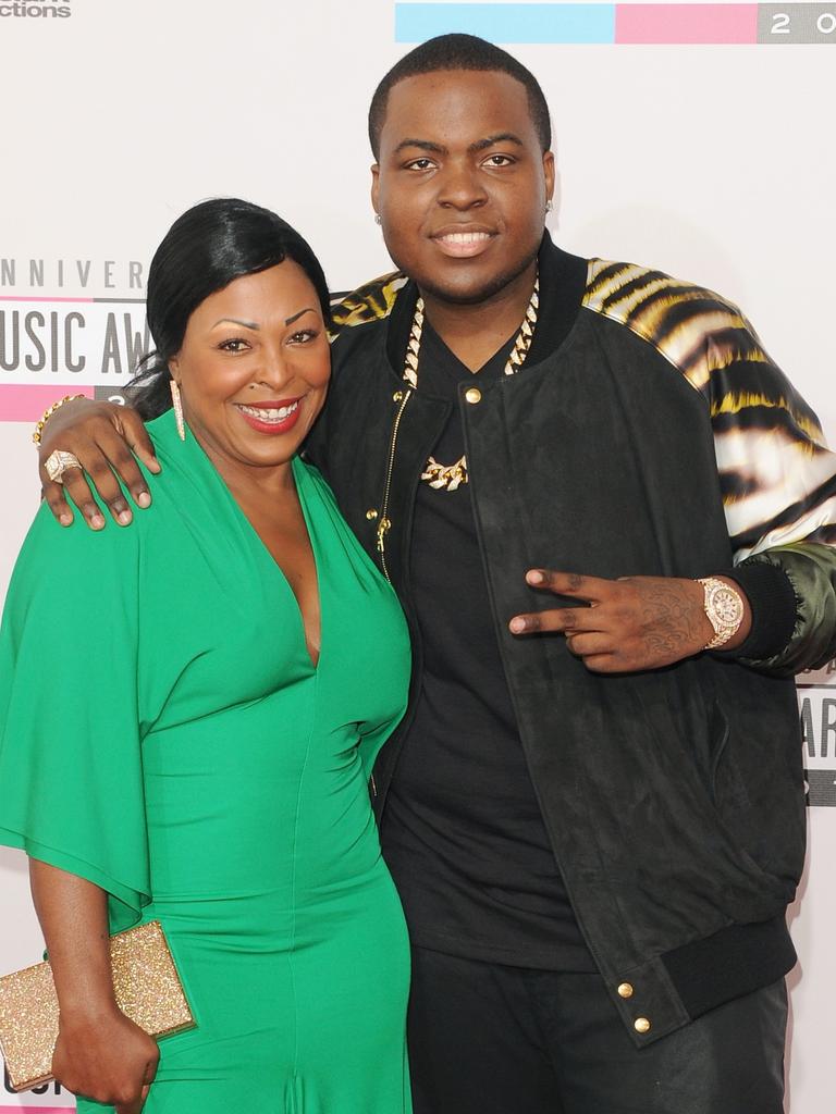 Kingston with his mother, who has been taken into custody. Picture: Getty