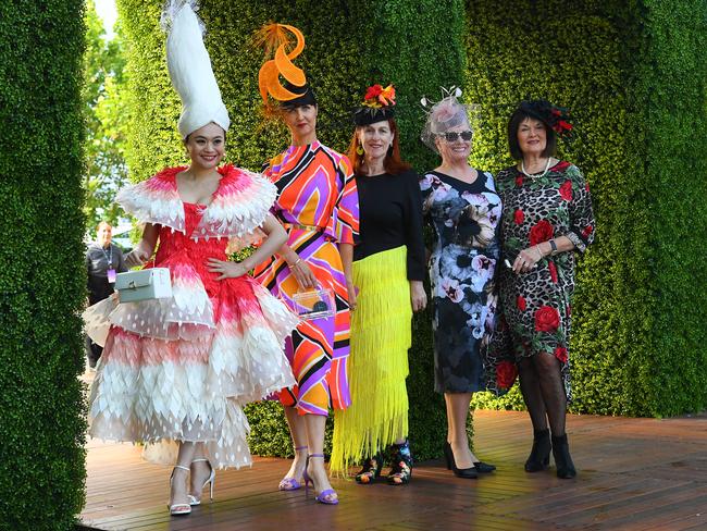 Fashions on the Field contestants pose for a photograph in the Park. Picture: AAP Image/James Ross