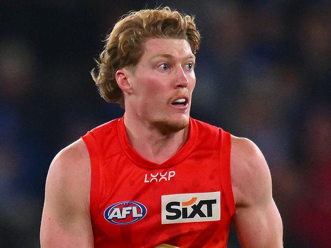 MELBOURNE, AUSTRALIA - JULY 06: Matt Rowell of the Suns runs with the ball during the round 17 AFL match between North Melbourne Kangaroos and Gold Coast Suns at Marvel Stadium, on July 06, 2024, in Melbourne, Australia. (Photo by Morgan Hancock/AFL Photos/via Getty Images)