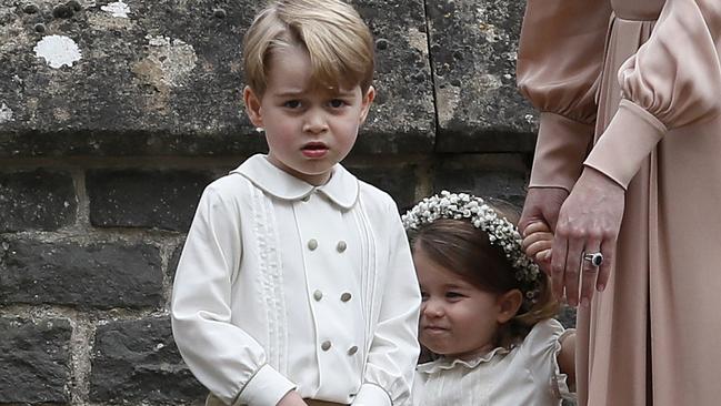 Prince George and Princess Charlotte are seen with Catherine, Duchess of Cambridge, right at Aunt Pippa Middleton wedding to James Matthews. Picture: Getty