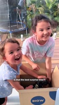 Aussie daughters surprised by puppy