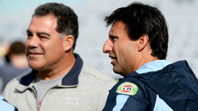 Mal Meninga chats with NSW coach Laurie Daley at Blues training on Tuesday. Pic: Gregg Porteous