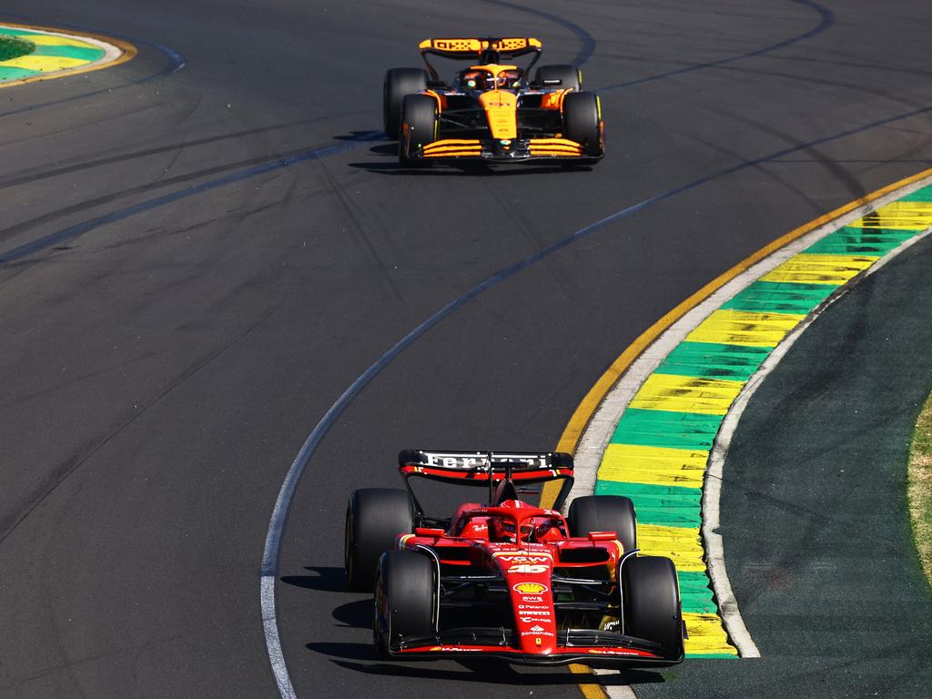 Charles Leclerc leads Oscar Piastri. (Photo by Mark Thompson/Getty Images)