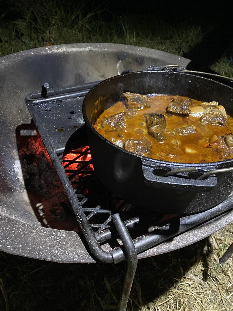 Campfire cooking at the foot of Barrington Tops National Park.