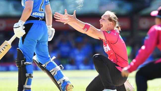 Sarah Aley celebrates taking the wicket of the Strikers’ Tabatha Saville.