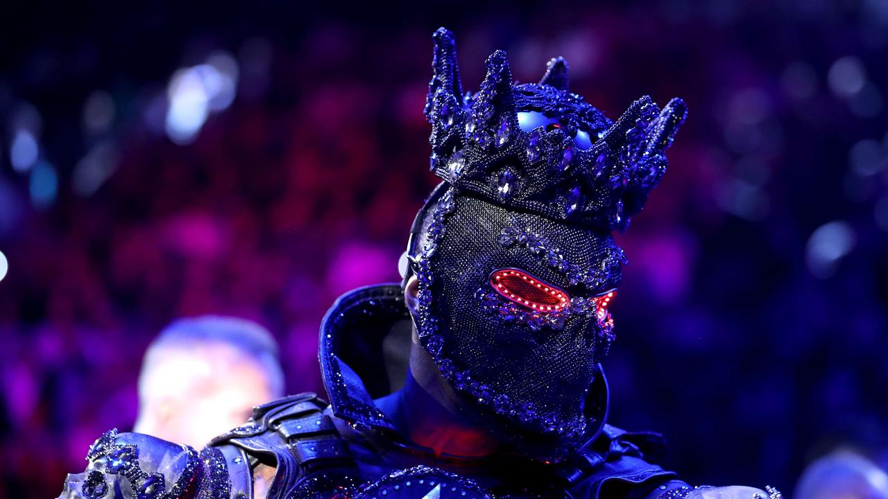 Deontay Wilder entered the ring in elaborate costume. His trainer says it may have contributed to his defeat.