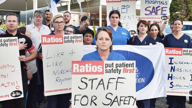 HKH NSW NMA branch president Michelle Rosentreter fronts nursing staff from all divisions outside Hornsby Hospital Emergency Department at Hornsby. (AAP IMAGE / Troy Snook)