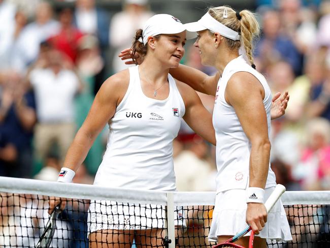 Barty and Kerber meet at the net after the match. Picture: AFP